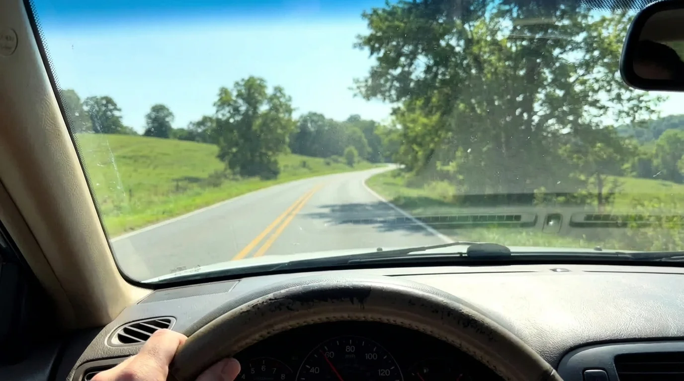 A car driving smoothly, indicating improved horsepower with FuelSync.